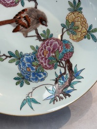 A pair of Chinese Dutch-decorated plates with birds among flowering branches, 18th C.