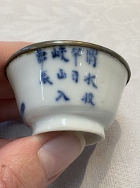 A pair of Chinese blue and white 'Bleu de Hue' cups with calligraphy for the Vietnamese market, 19th C.