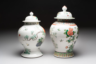 Two Chinese famille verte 'birds and flowers' vases and covers, 19th C.