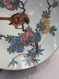 A pair of Chinese Dutch-decorated plates with birds among flowering branches, 18th C.