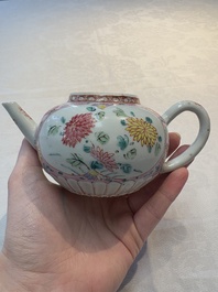 A Chinese famille rose moulded teapot and stand with floral design, Yongzheng/Qianlong
