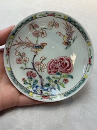 A set of six Chinese famille rose 'birds among flowering branches' cups and saucers, Yongzheng/Qianlong