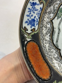 A Chinese famille rose silver and gilt-decorated plate with a lady playing guqin, Yongzheng/Qianlong