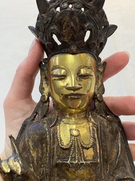 A Chinese parcel-gilt bronze Guanyin, Ming