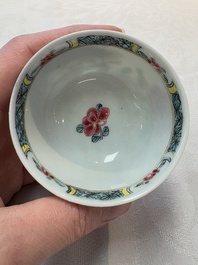 A set of six Chinese famille rose 'birds among flowering branches' cups and saucers, Yongzheng/Qianlong
