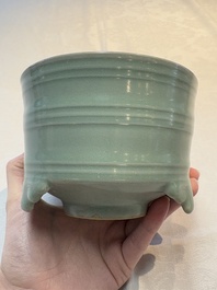 A Chinese Longquan celadon cylindrical tripod censer with trigrams design, Yuan/Ming