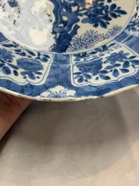 A Chinese blue and white dish with floral design, artemisia leaf mark, Kangxi