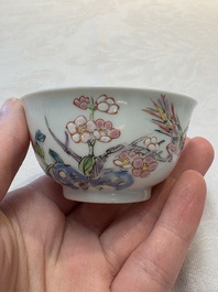 A set of six Chinese famille rose 'birds among flowering branches' cups and saucers, Yongzheng/Qianlong