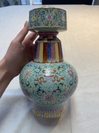 A Chinese famille rose altar vase with 'bajixiang' design, 'benbahu', Qianlong mark, 20th C.
