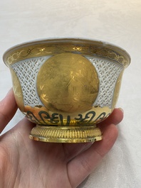 A Chinese European-decorated gilt bronze-mounted blue and white reticulated bowl, Transitional period