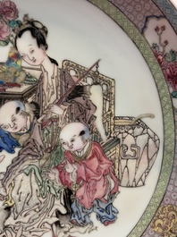 A fine Chinese famille rose ruby-back 'lady and boys' eggshell plate, Yongzheng