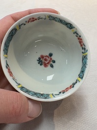 A set of six Chinese famille rose 'birds among flowering branches' cups and saucers, Yongzheng/Qianlong