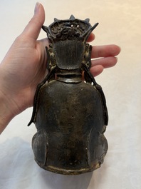 A Chinese parcel-gilt bronze Guanyin, Ming