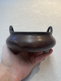 A Chinese bronze tripod censer, Xuande mark, 17/18th C.