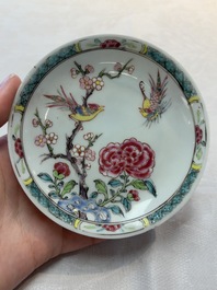A set of six Chinese famille rose 'birds among flowering branches' cups and saucers, Yongzheng/Qianlong
