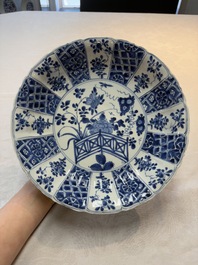 A Chinese blue and white dish with floral design, artemisia leaf mark, Kangxi