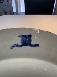 A Chinese blue and white 'peacock border' dish, Kangxi
