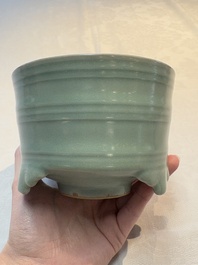 A Chinese Longquan celadon cylindrical tripod censer with trigrams design, Yuan/Ming