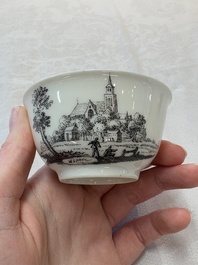 A Chinese grisaille 'Hoorn, Aspen and Valkenburg' cup and saucer, Qianlong
