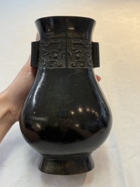 A fine Chinese archaistic bronze 'touhu' vase with 'taotie' design, 17/18th C.