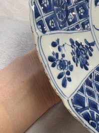 A Chinese blue and white dish with floral design, artemisia leaf mark, Kangxi