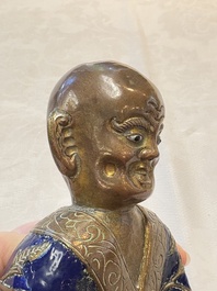 A Chinese champlev&eacute; figure of Luohan, Qianlong mark, 18/19th C.