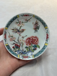 A set of six Chinese famille rose 'birds among flowering branches' cups and saucers, Yongzheng/Qianlong