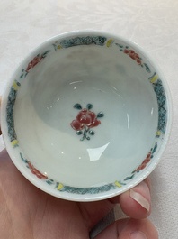 A set of six Chinese famille rose 'birds among flowering branches' cups and saucers, Yongzheng/Qianlong