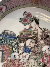 A fine Chinese famille rose ruby-back 'lady and boys' eggshell plate, Yongzheng