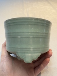 A Chinese Longquan celadon cylindrical tripod censer with trigrams design, Yuan/Ming
