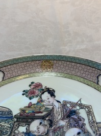 A fine Chinese famille rose ruby-back 'lady and boys' eggshell plate, Yongzheng