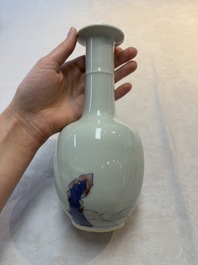A pair of Chinese blue, white and copper-red 'bats among the clouds' vases, 19th C.