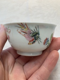 A set of six Chinese famille rose 'birds among flowering branches' cups and saucers, Yongzheng/Qianlong