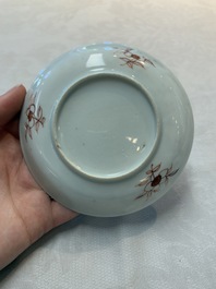 A set of six Chinese famille rose 'birds among flowering branches' cups and saucers, Yongzheng/Qianlong