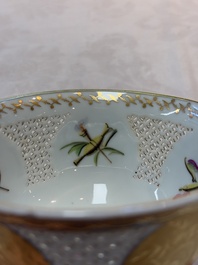 A Chinese European-decorated gilt bronze-mounted blue and white reticulated bowl, Transitional period