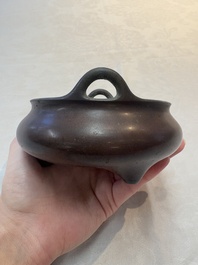 A Chinese bronze tripod censer, Xuande mark, 17/18th C.