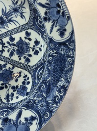 A Chinese blue and white 'peacock border' dish, Kangxi