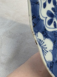 A Chinese blue and white dish with floral design, artemisia leaf mark, Kangxi