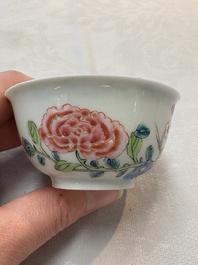 A set of six Chinese famille rose 'birds among flowering branches' cups and saucers, Yongzheng/Qianlong