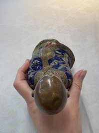 A Chinese champlev&eacute; figure of Luohan, Qianlong mark, 18/19th C.