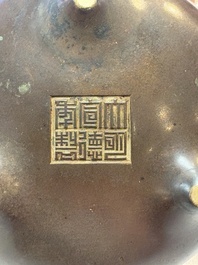 A Chinese bronze tripod censer, Xuande mark, 17/18th C.