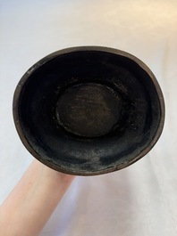 A fine Chinese archaistic bronze 'hu' vase with dragon handles, Yuan