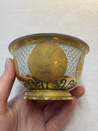 A Chinese European-decorated gilt bronze-mounted blue and white reticulated bowl, Transitional period