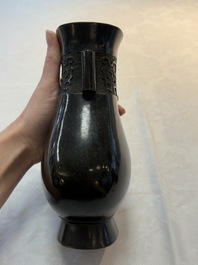 A fine Chinese archaistic bronze 'touhu' vase with 'taotie' design, 17/18th C.