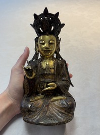 A Chinese parcel-gilt bronze Guanyin, Ming