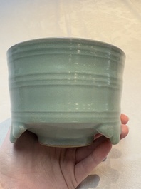 A Chinese Longquan celadon cylindrical tripod censer with trigrams design, Yuan/Ming