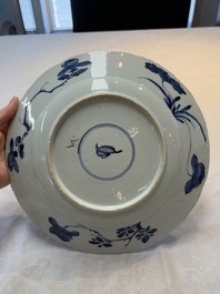 A Chinese blue and white dish with floral design, artemisia leaf mark, Kangxi
