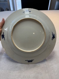 A Chinese blue and white 'peacock border' dish, Kangxi