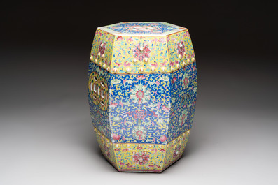 A Chinese famille rose blue and yellow-ground hexagonal garden seat, 19th C.