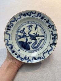 A Chinese blue and white 'floral' dish and a 'phoenix' plate, Ming